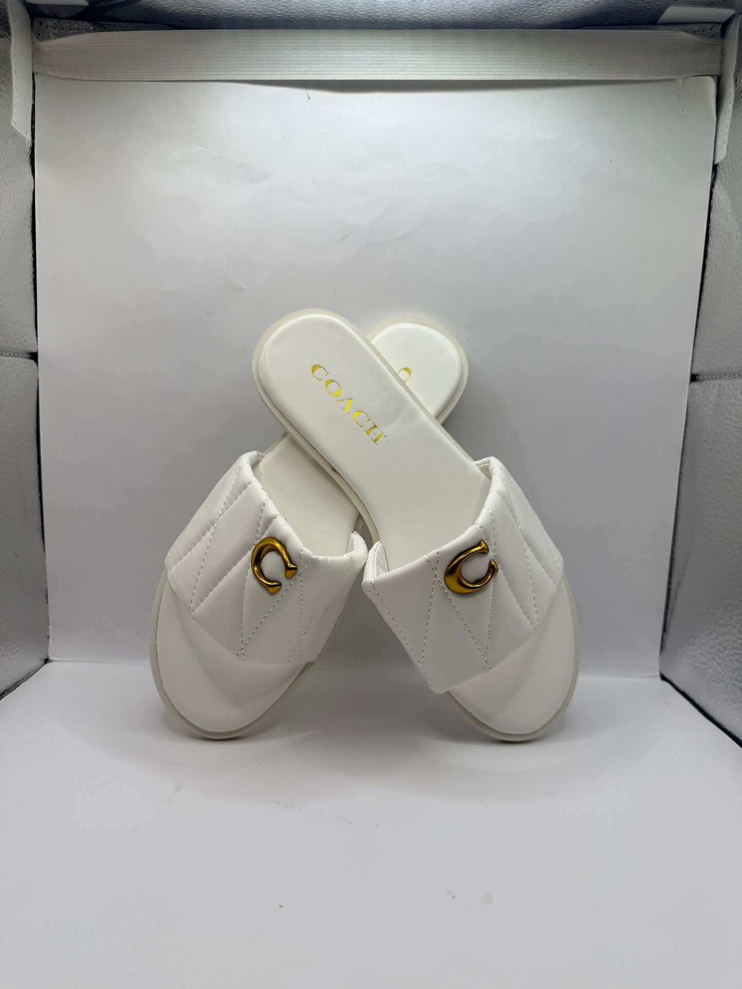 White Coach Slides